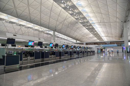 the Hong Kong international airport, one of the world's largest passenger terminal quiet, following the announcement of travel restrictions worldwide. HK Government stated the anti-epidemic measures, which including the suspension of all transits flights and transfer services.