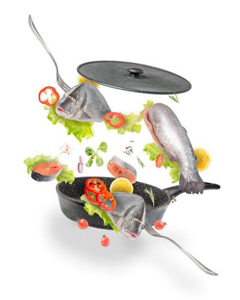 istock Fish with vegetables on a white background with spices and herbs. 1295998816