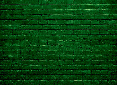 Green brick texture wall background.