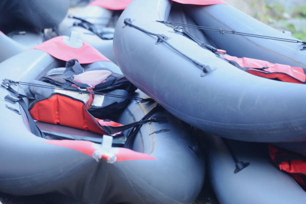 istock Inflatable boats on the mountain river shore. 1296005227
