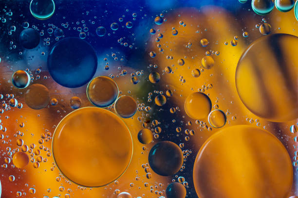 istock image of oil drop on water 1296006229