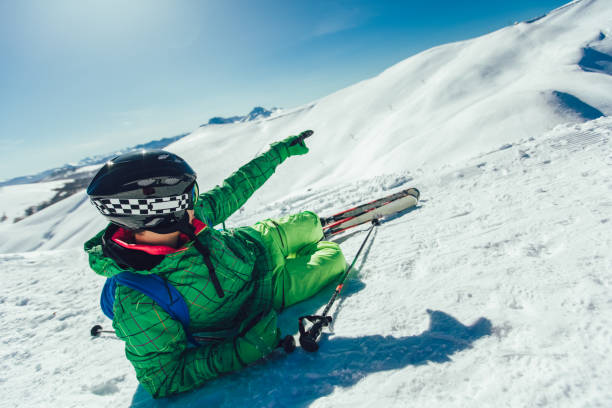 istock Young athlete freestyle Skier having fun while running downhill in beautiful landscape on sunny day during winter season 1296006424