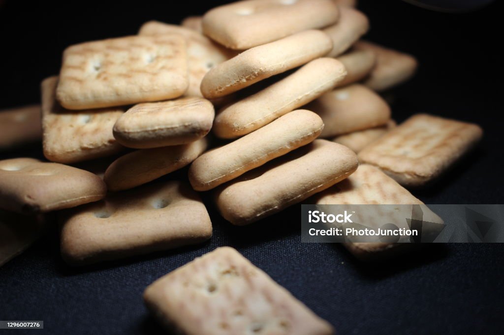 Rectangular Rice Biscuits Many Rectangular Biscuits With Small Pores On Black Floor Stock Photo ...