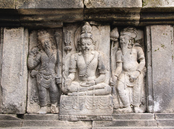 istock Bas-relief of meditating old man, Prambanan, Yogyakarta, Java, Indonesia 1296010108