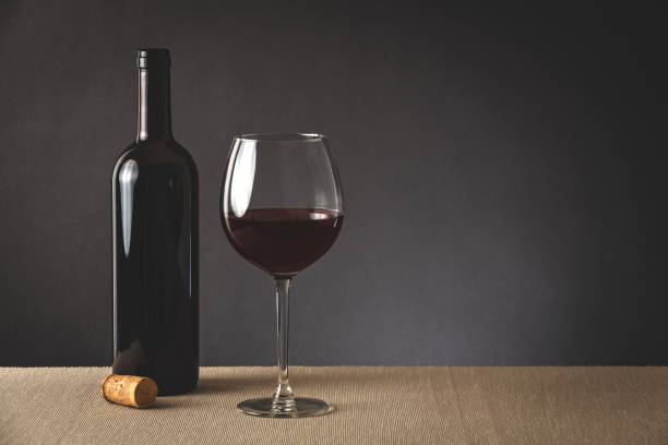 istock Glass and bootle of wine 1296011499