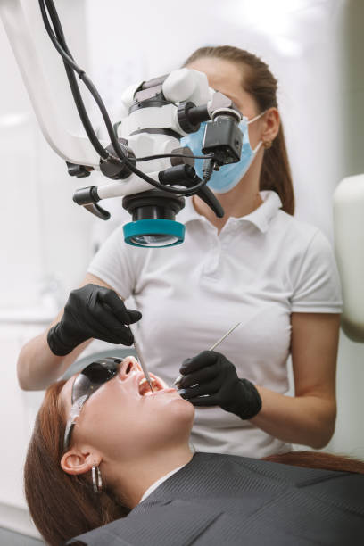 istock Female patient at ental clinic 1296012077