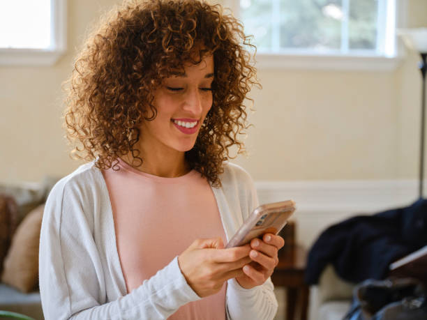 istock Smiling Woman in a Home 1296014204