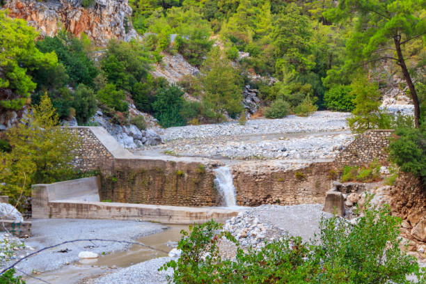 Small waterfall on mountain river in Kesme Bogaz canyon, Antalya province in Turkey Small waterfall on mountain river in Kesme Bogaz canyon, Antalya province in Turkey bogaz stock pictures, royalty-free photos & images
