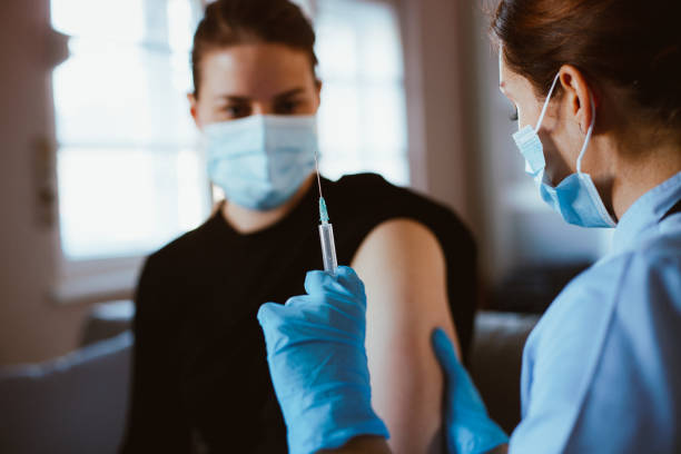 Young woman vaccinated. COVID-19 concept.