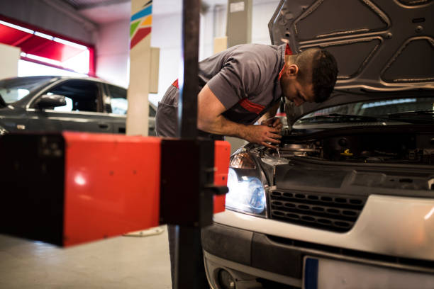 istock Light calibrating machine in car preparing the vehicle for technical inspection of headlight 1296017598