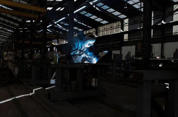 istock Welding and Plasma in a a metal fabricating facility 1296017737