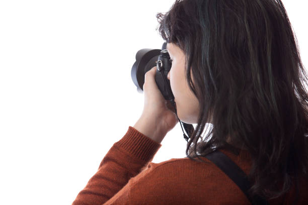 istock Side View of a Photographer on a White Background for Composites 1296020700