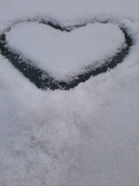 istock Painted heart in the snow 1296020718