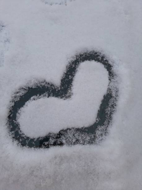 istock Painted heart in the snow 1296020732