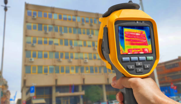 istock Recording Heat Loss Outside building Using Infrared Thermal Camera 1296026689