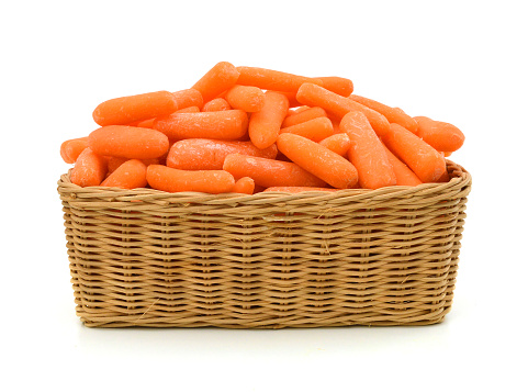 Pile of baby carrots in basket