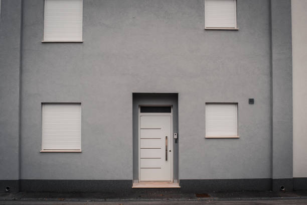 istock Minimalist facade of modern apartment building 1296028448