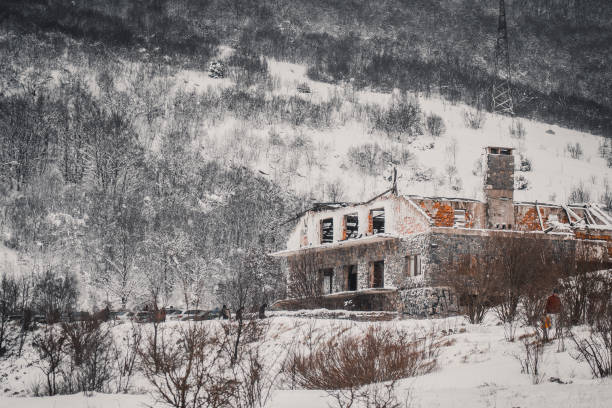 An old house sits abandoned near farm fields outside of Cedar City, Utah. Taken December 2009.