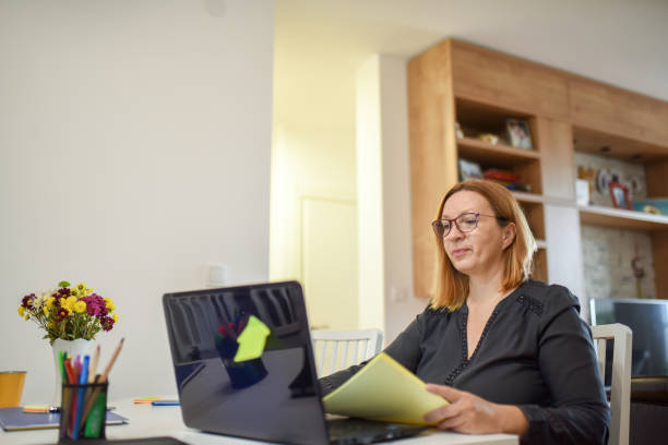 istock Woman working from home 1296033600
