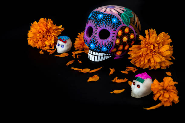 istock Colorful skulls and cempasuchil flowers (for day of the dead, Mexico) 1296036362