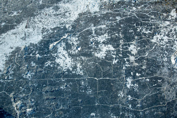 istock Texture, texture, old cracked concrete. Spoiled concrete surface for design and background. Cracked concrete wall, close-up. Free space for text. 1296038140