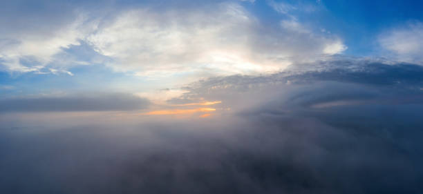 istock Misty cloud high in the sky at dawn. 1296039358
