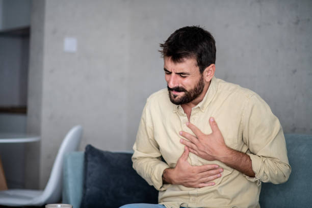 istock Man feeling pain in chest. 1296047183