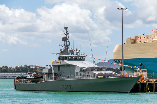 Army ship at dock, background with copy space, full frame horizontal composition