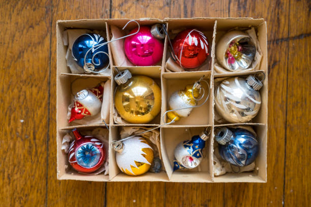 istock Vintage Box of Christmas Ornaments in Original Packaging 1296049711