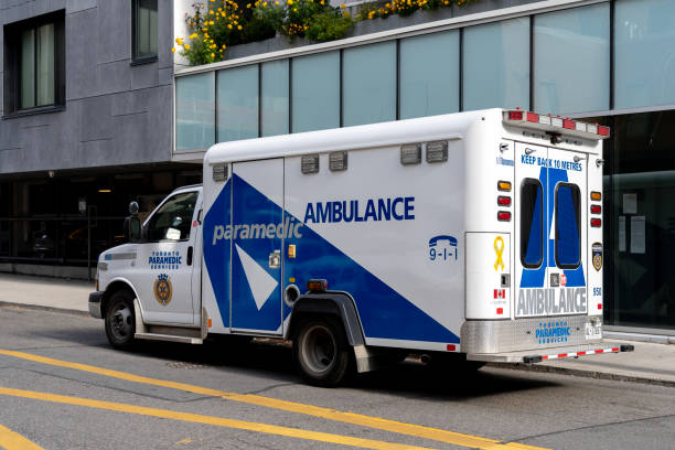 A TPS ambulance car is seen in Toronto. Toronto, Canada - November 9, 2020: A TPS ambulance car is seen in Toronto; The City of Toronto Paramedic Services (TPS) is the statutory emergency medical services provider. ambulance photos stock pictures, royalty-free photos & images