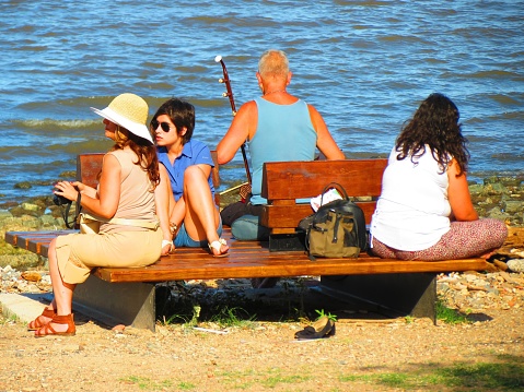 Buenos Aires, Argentina - November 26, 2018 People relaxing at the Costanera Sur Ecological Reserve Park.