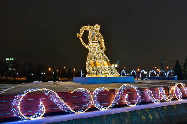 Russia Moscow 12/30/2019. Beautiful sculptures made of garlands glow differently, people come to watch this light show on Poklonnaya Hill.