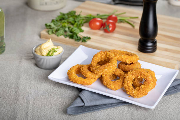 Onion Rings plate Onion Rings plate mayonnaise deep fried onion rings stock pictures, royalty-free photos & images