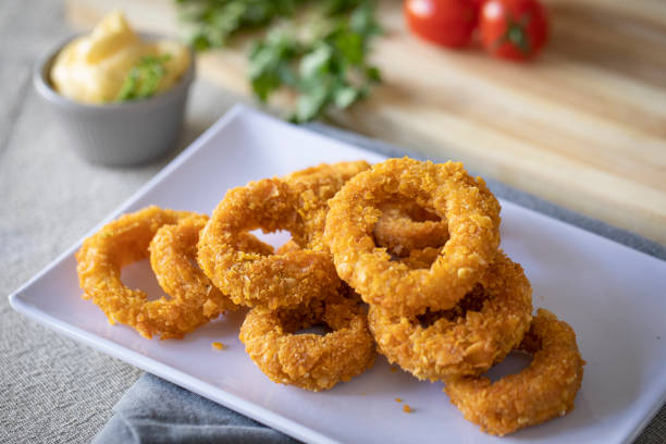 istock Onion rings whit mayonnaise 1296063133