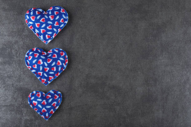 istock Valentines day background with hearts and gray background. 1296063715