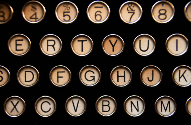Keyboard of old portable typewriter, writing technology in office, journalism or studies.