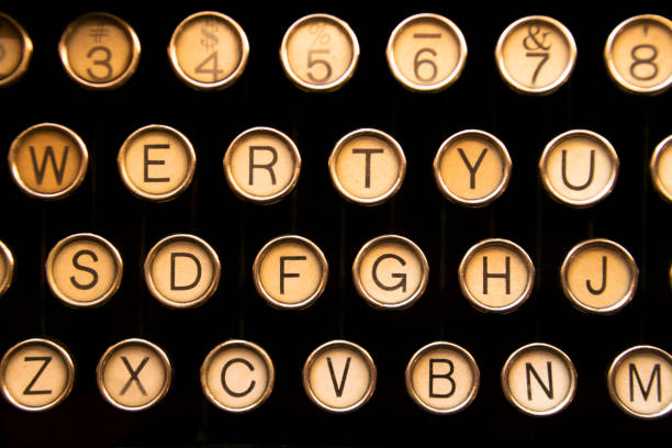 istock Keyboard of old portable typewriter, writing technology in office, journalism or studies. 1296063941