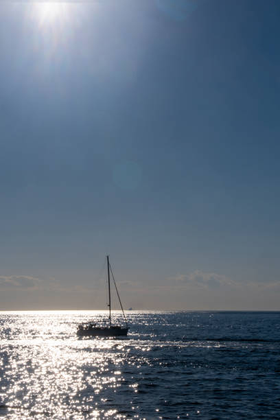 istock Yacth silhouette on the sea, sailing boat 1296067535