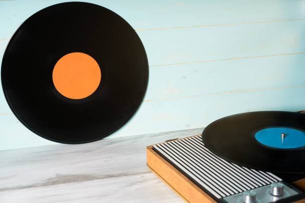istock Vinyl record and vintage gramophone 1296067673