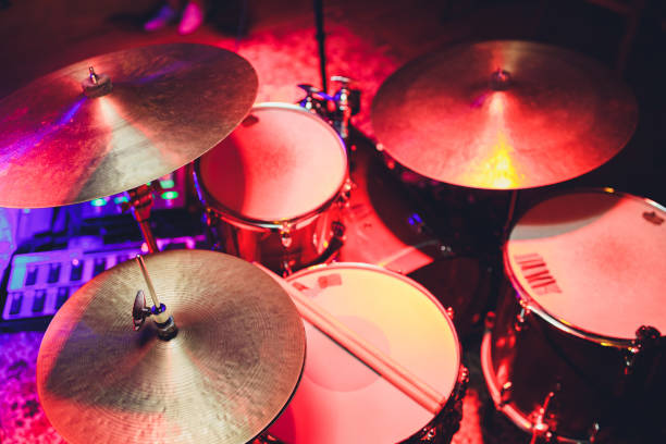 istock Drum Set with some cymbals on stage before a live Concert. 1296068890