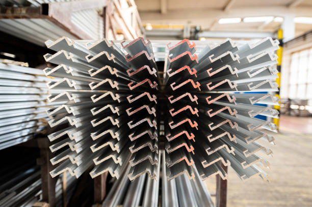 Aluminium profiles in factory, horizontal composition, high angle view