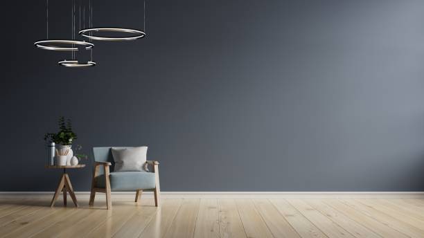 istock The interior has a dark blue armchair on empty dark wall background. 1296071297
