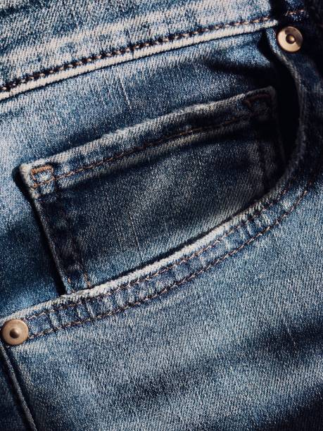 istock Denim jeans pocket background, Cotton fabric 1296080001