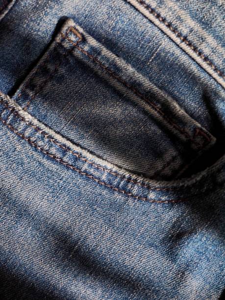 istock Denim jeans pocket background, Cotton fabric 1296080014