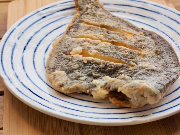 istock Asian food Pacific sanddab grilled 1296080065