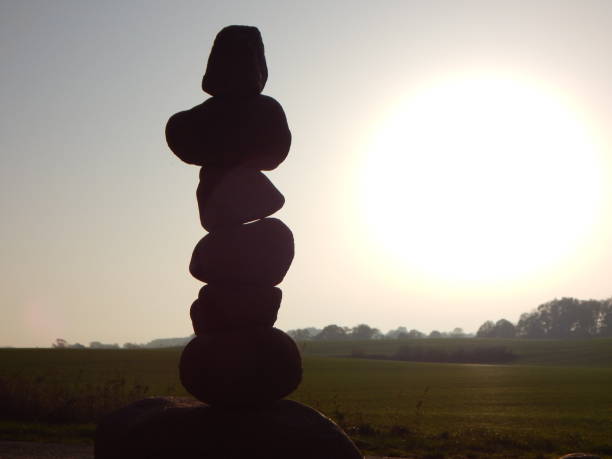 istock Stone balance in autumn at sunset 1296080678