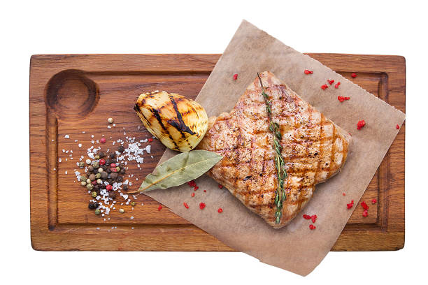 istock Grilled tender meat with vegetables. Restaurant serving concept. Isolated. 1296082215