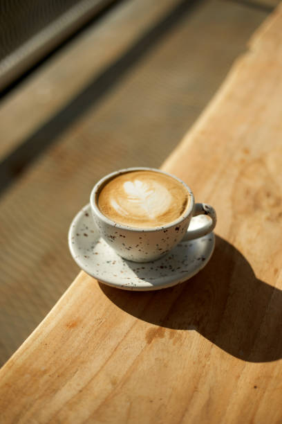 istock hot latte art coffee on wooden 1296086488