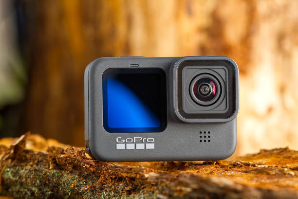 Tallinn, Estonia - December 11, 2020: GoPro HERO 9 Black action camera outdoors in forest Tallinn, Estonia - December 11, 2020: GoPro HERO 9 Black action camera outdoors in forest close up shoot point and shoot camera stock pictures, royalty-free photos & images