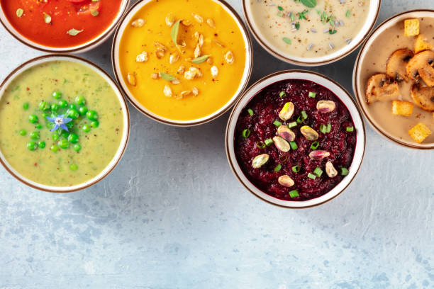 istock Vegan soup banner with a place for text. Various vegetable soups 1296090147